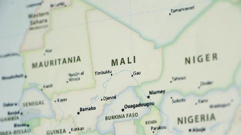 Mali on a political map of the world. Video defocuses showing and hiding the map.