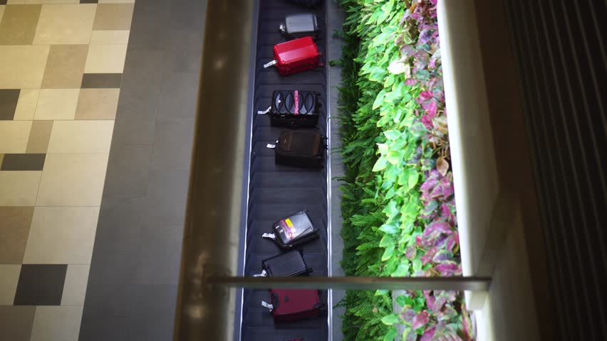 baggage claim area of terminal, inside airport : 4k, a Technology Video by Chokniti-Studio
