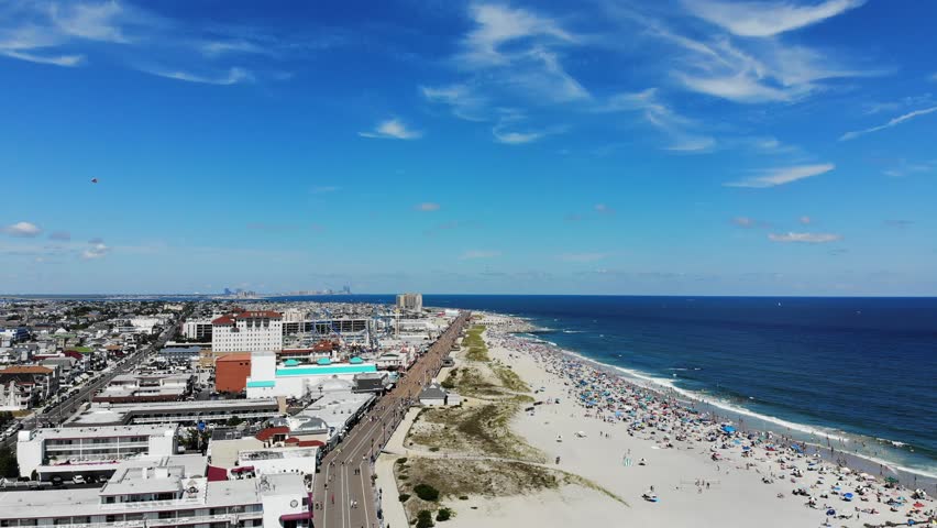 A busy beach day in Ocean City New Jersey. Views of the boardwalk, beach, and city on June 20th 2018.