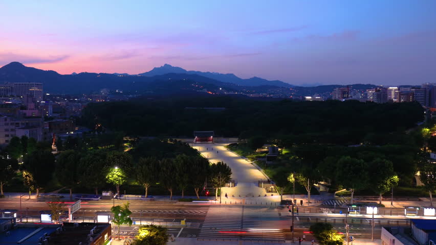 Traffic Time Lapse Seoul City SkyLine and Sewoon Plaza Tower Jongmyo Shrine in Seoul South Korea. 
