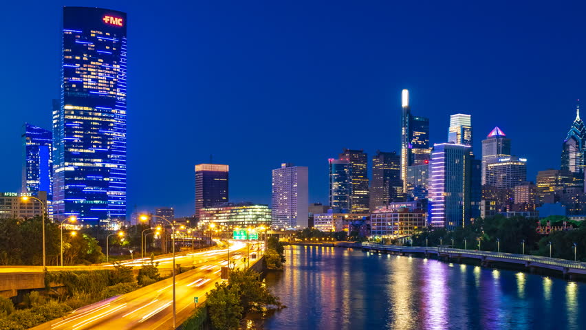 Philadelphia night time lapse of Schuylkill river trail by south street bridge