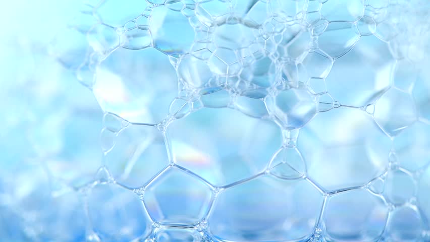 Foam. Soap foam popping bubbles background. Soap sud macro structure. Rotated soap foam close-up, blue background. 4K UHD video | Shutterstock HD Video #1014038549