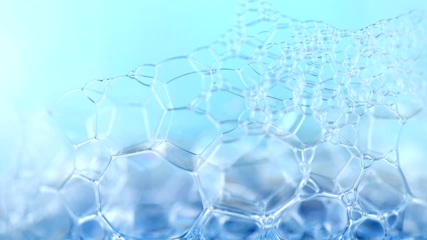 Foam. Soap foam popping bubbles background. Soap sud macro structure. Rotated soap foam close-up, blue background. 4K UHD video | Shutterstock HD Video #1014038783