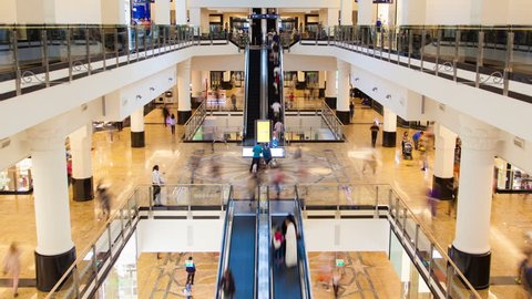 Shopping Mall fast flow of people on escalators time-lapse