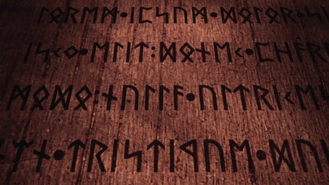 An ancient wooden tablet filled with carved runic signs, 3d panning from left to right. The text is fake, as it's the latin (public domain) Lorem Ipsum.
