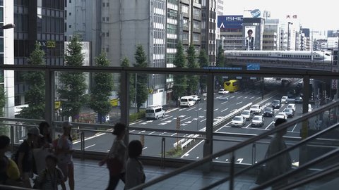 TOKYO / JAPAN - JUNE  24, 2018 /A modern metropolis. Densely populated streets of Tokyo. High-speed train Shinkansen.