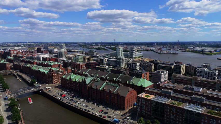 Aerial view of Hamburg city. Rivers, boats, old historic buildings. Amazing cityscape view.
