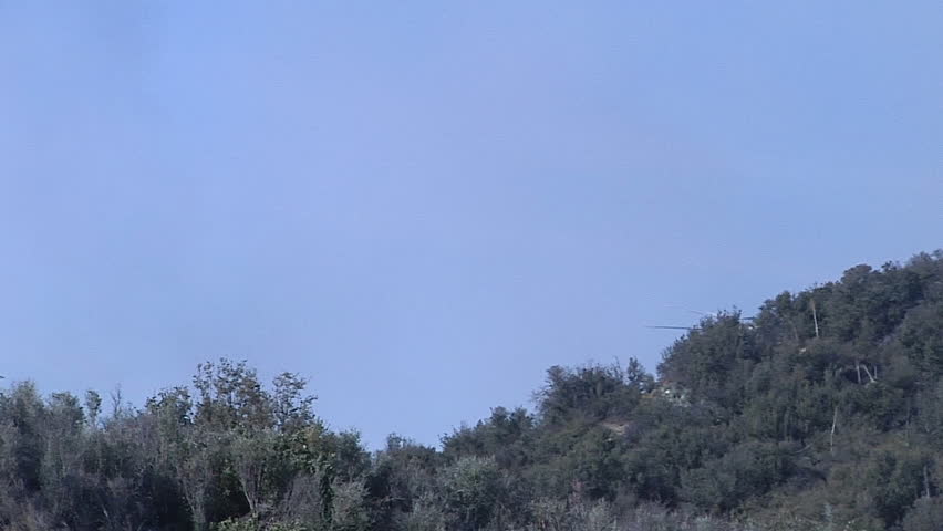 2017 - firefighting helicopters make water drops on the Thomas Fire in Santa Barbara, California.