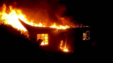 2017 - a house burns to the ground at night during the Thomas Fire in Ventura and Santa Barbara County.