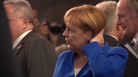 2018 - Angela Merkel, Emmanuel Macron, Kolinda Grabar-Kitarovic at the NATO summit in Brussels, Belgium.
