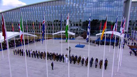 2018 - international dignitaries pose for a group photo at the NATO summit in Brussels, Belgium.