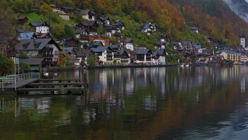 Traditional homes near lake in famous Hallstatt village in Salzkammergut area, Austria