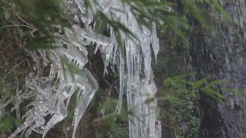 Ice stalactites on a waterfall during winter. Serra catarinense. Urubici, Santa Catarina / Brazil