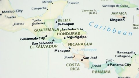 Guatemala, Honduras, and Nicaragua on a political map of the world. Video defocuses showing and hiding the map.