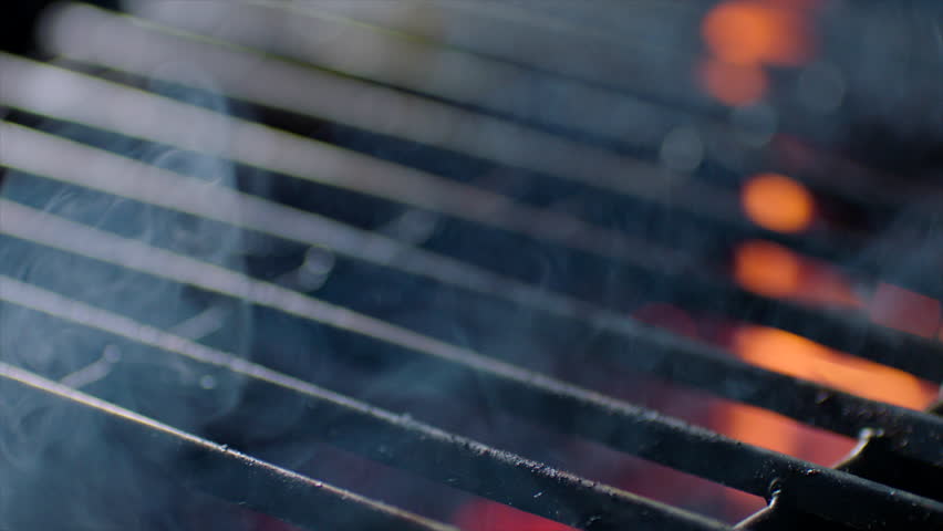 Close up of grill ready with fire flames, slow motion Royalty-Free Stock Footage #1014077639