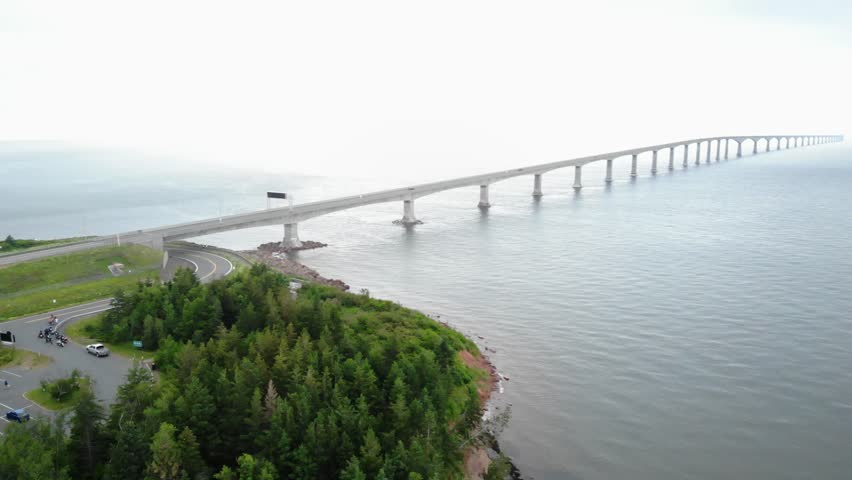 A beautiful aerial shot of the incredible confederation bridge that connects New Brunswick and Prince Edward Island with fog in the background Royalty-Free Stock Footage #1014102131