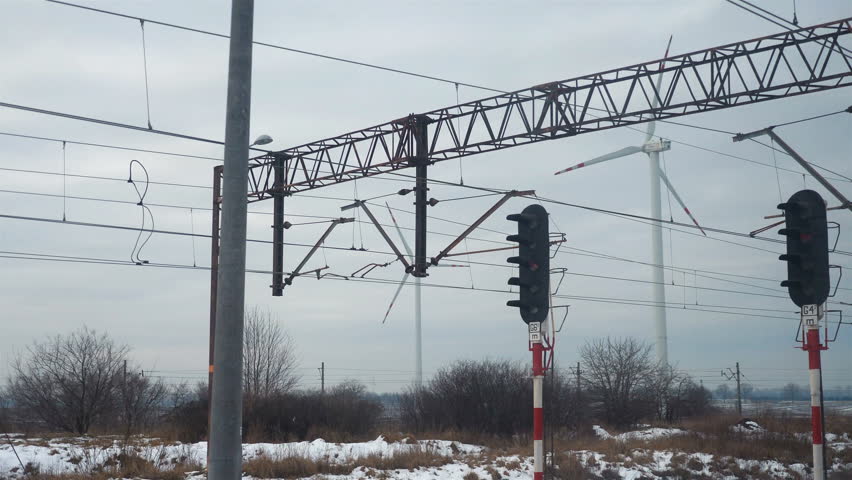 Professional video of point of view from train passing windmills in 4k slow motion 60fps

