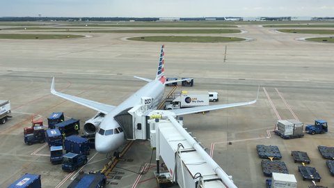 DALLAS, TX, USA - MAY 11, 2017: American Airlines Airplane being serviced at Gate at DFW Airport