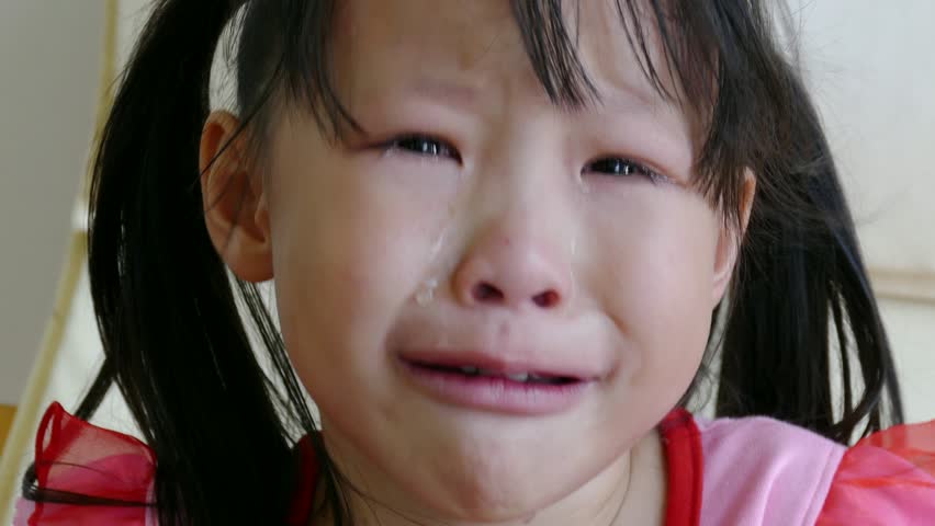 Asian girl cries mommy