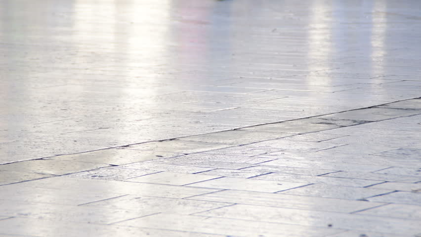 Human legs walking - Tourists at People`s Square  In Split, Croatia