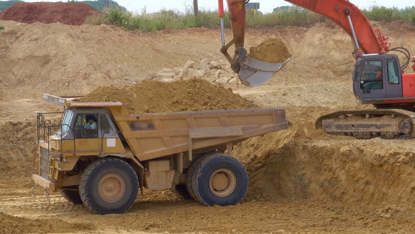 Dump truck loaded with sand. 4K. Royalty-Free Stock Footage #1014158711