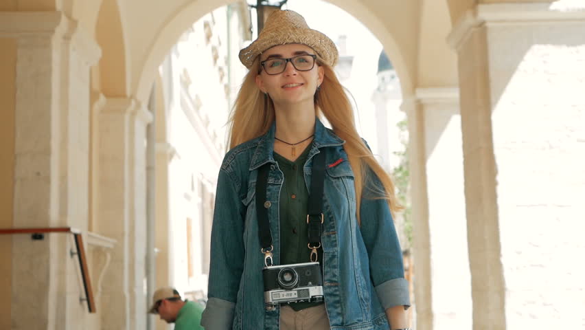 tourist woman Walking narrow streets of lviv, Ukraine. enjoying European summer holiday travel vacation adventure