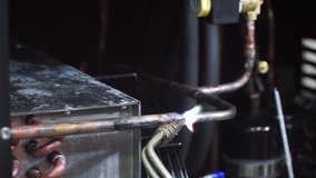 Welding steel with electrode welder. Clip. Man welding metal by heating a metal rod