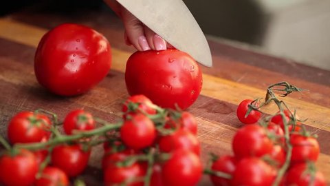 Slicing the Tomato with Kitchen Knife 