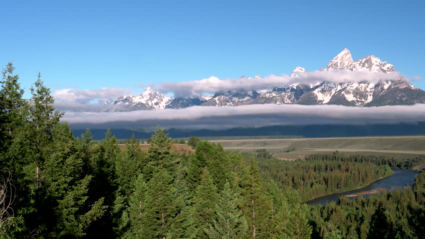 a panning right shot of the tetons and snake river tetons from an overlook in the grand tetons national park in the united states