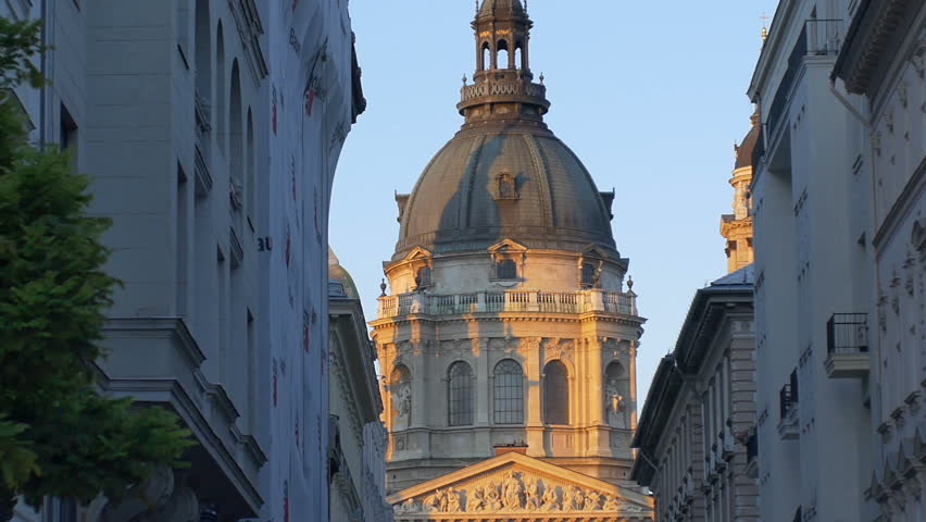 View of Saint Stephen Church, between other buildings, in downton of Budapest city.