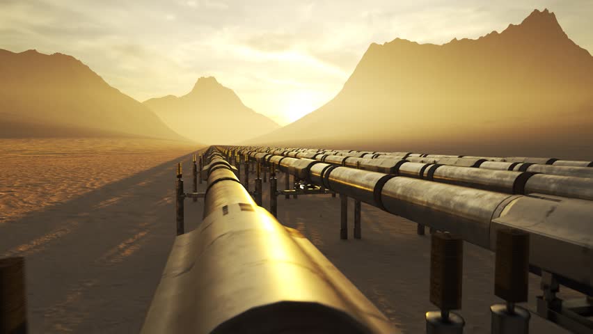 03584 Five streams of pipeline with heat-pipes running through a desert with mouintains in background.
