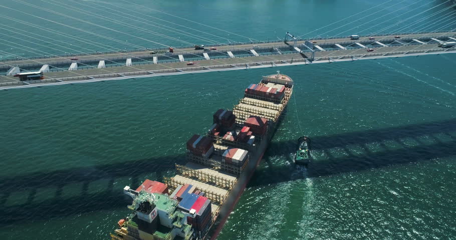 The cargo container vessel calls for loading into the container terminal of Hong Kong Aerial view 4K Royalty-Free Stock Footage #1014225932