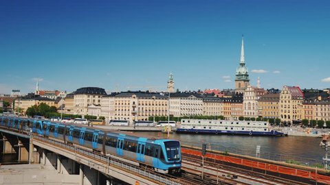 The cityscape of Stockholm, in the foreground the train passes. Transport in the capital of Sweden