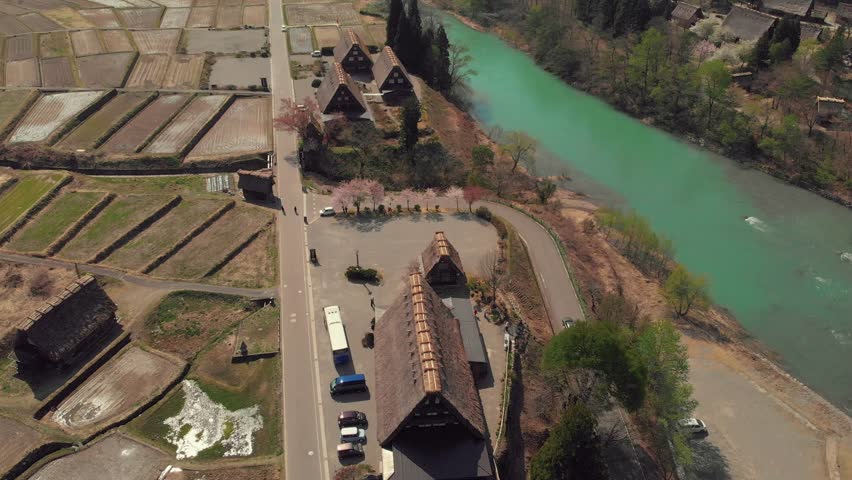 Aerial view of Shogawa River and snow mountains in Shirakawa-go village in Japan.