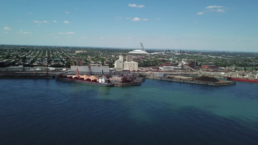 Aerial of Montreal Skyline over the St Laurent River in Quebec Canada