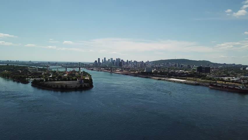 Aerial of Montreal Skyline over the St Laurent River in Quebec Canada