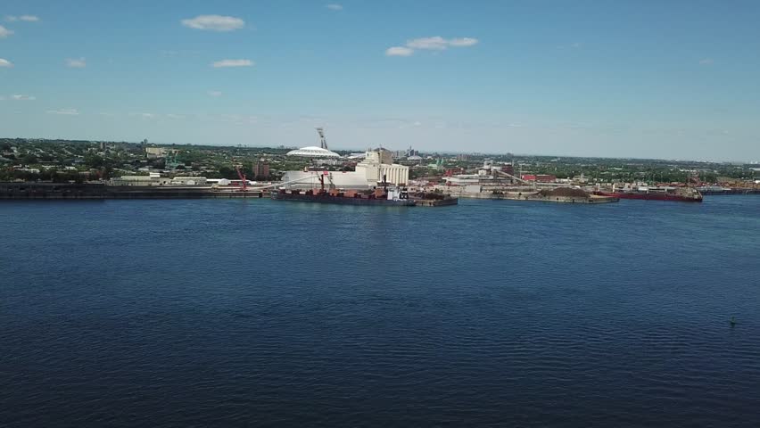 Aerial of Montreal Skyline over the St Laurent River in Quebec Canada