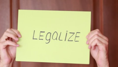 "Legalize" inscription on color paper