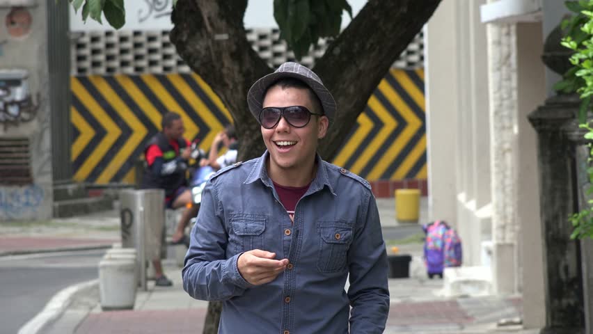 Young Man Walking in Urban Area