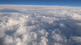 Flight above the clouds in 4k