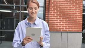 Online Video Chat on Tablet by Walking Woman on Street