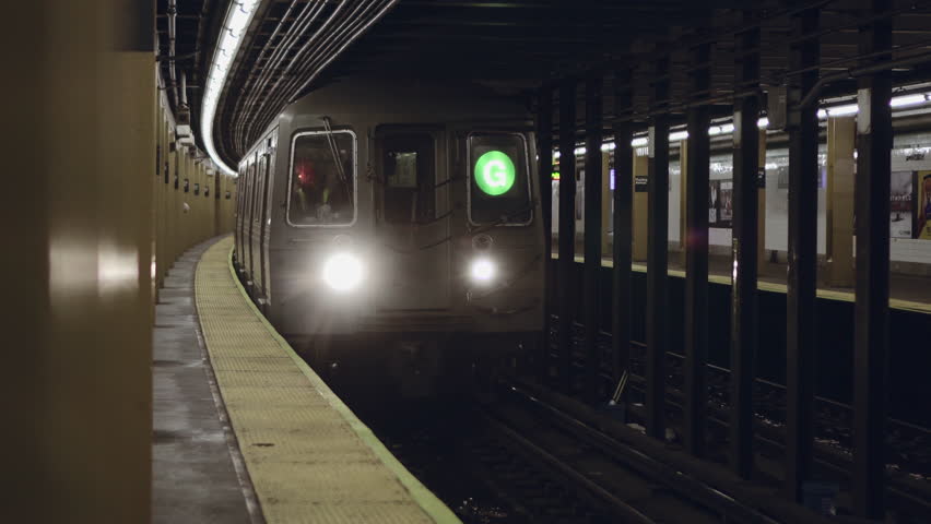 New York City subway train arriving to the underground statio