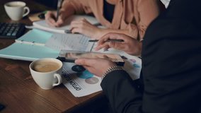 Business team office small business start up company planning creative meeting using digital tablets showing financial data and graphs. Business, people, paperwork concept - Powered by Shutterstock - Get 15% off with code: PIKWIZARD15