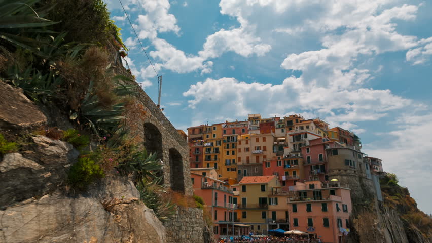Wide shot towards the village of Manarola in Cinque Terre, Liguria, Italy, a UNESCO World Heritage Site, famous for its coastline, five villages and surrounding hillsides