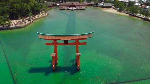 Aerial Drone Flying Over Itsukushima Shrine at Miyajima, Hiroshima, Japan.