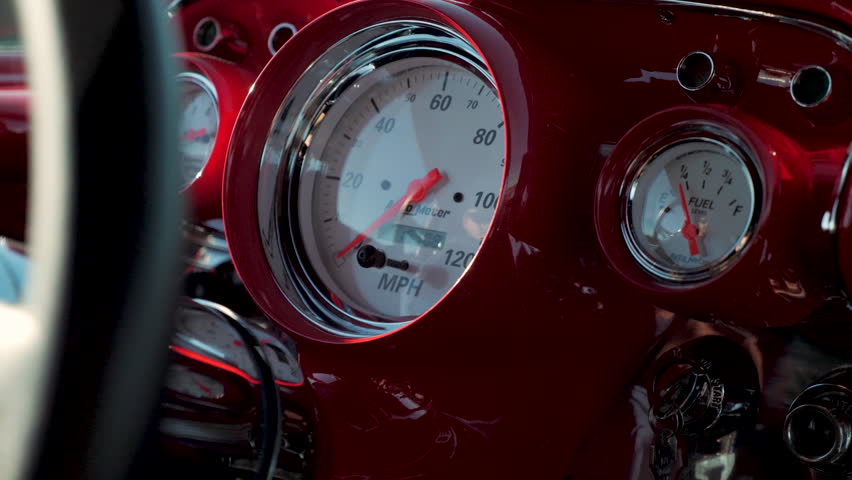 Close Up Red Dashboard of 1950's Classic Muscle Car