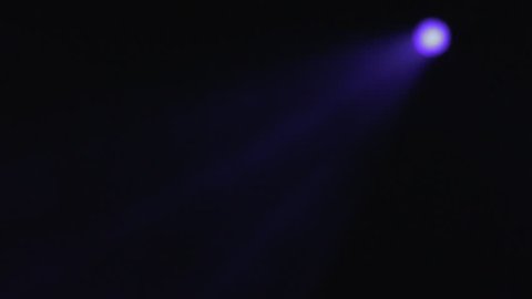 Stage Lights. Blue. Bright stage lights flashing. Stock. Abstract blue spot light with smoke