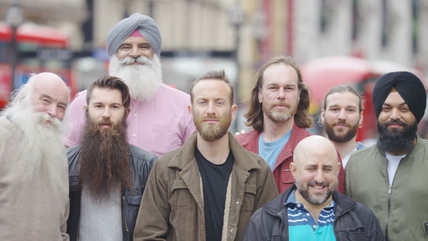 Portrait of a group of men in the city with beards looking to camera Royalty-Free Stock Footage #1014370148