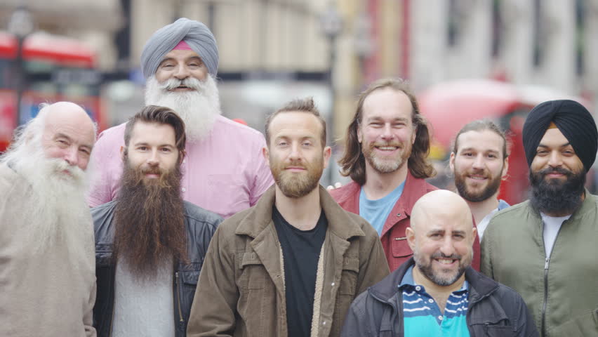 Portrait of a group of men in the city with beards looking to camera | Shutterstock HD Video #1014370148