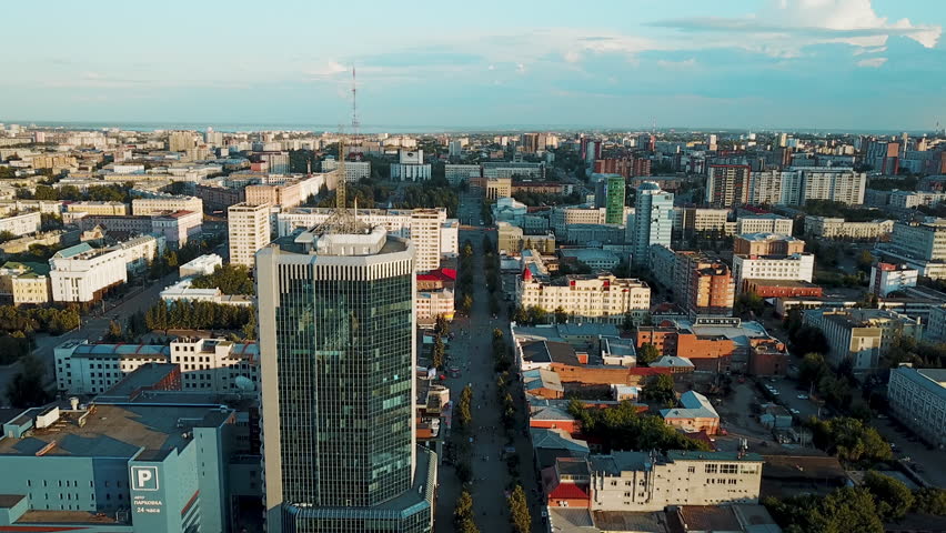 Drone flight over the main pedestrian street, sunny weekend evening in the family rest area, city center of the South Ural capital, Chelyabinsk, Russia Royalty-Free Stock Footage #1014370511